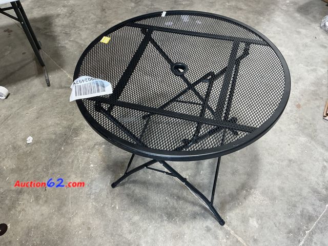 Lot 44-198e - Black Metal Round Outdoor Patio Table See All Photo's E-Commerce Return, A basic inspection has been given to this item. Sold AS-IS.