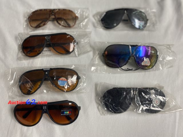 Lot 44-4000o - New. Seven pairs assorted men’s sunglasses. See photos. Appears New, A basic inspection has been given to this item. Sold AS-IS. See All Pho...