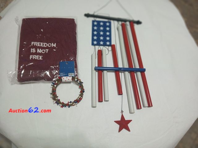 Lot 44-2014w - New in package FREEDOM IS NOT FREE throw.  One new 4th of July garland.  One gently used set of 4th of July wind chimes.  See all photos. Ap...