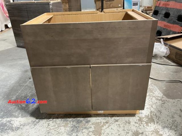 Lot 44-4136t - 2 door undermount cabinet 36” x 24” damaged- see photos part of set- see lots 1527-1531 for set pieces - 2. E-Commerce Return, A basic inspe...