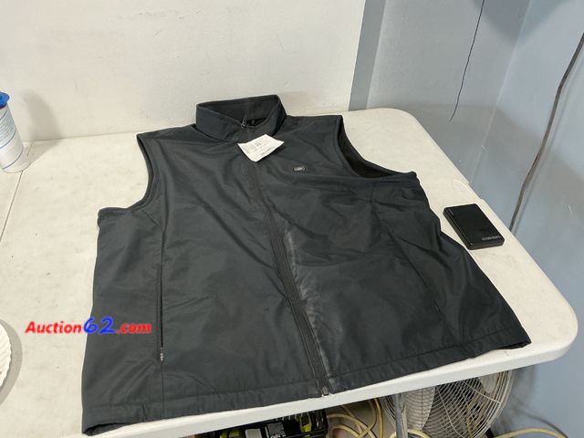 Lot 44-848 - Heated Vest XL/TG Black See All Photo's Not Tested E-Commerce Return, A basic inspection has been given to this item. Sold AS-IS. Dirty Used