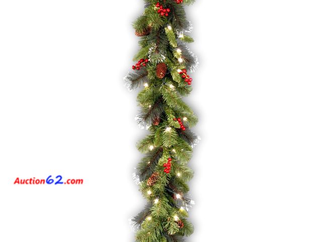 Lot 44-1602j - National Tree Company 9 ft Pre-Lit Crestwood Spruce Artificial Christmas Garland, Christmas Decoration with Glitter, Pinecones, Red Berries,...