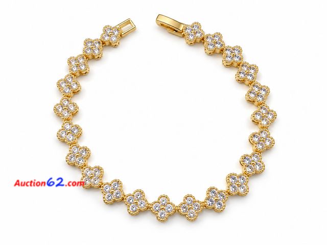 Lot 44-6004n - Women’s gold color iced clover bracelet approximately 7 inches. No markings. Appears New, A basic inspection has been given to this item. So...