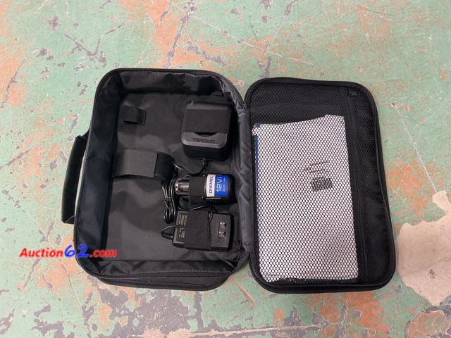 Lot 44-4016b - Dremel Charger, Battery, &amp; Bag- Missing Dremel 1. Appears New, A basic inspection has been given to this item. Sold AS-IS. 4. See All Ph...