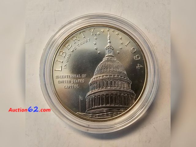 Lot 44-8363u - 1994 U.S. CAPITOL 90% SILVER DOLLAR COMMEMORATIVE. BRILLIANT UNCIRCULATED. MINTED IN DENVER. COMES IN AN AIR-TITE CAPSULE.-NT