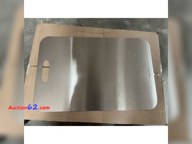 Lot 44-161 - Minadcin Metal Cutting Board with Handle Appears New, A basic inspection has been given to this item. Sold AS-IS.
