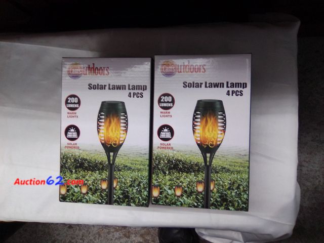 Lot 44-6175o - 2 sets of 4 pcs solar lawn lamps from cams outdoors. 200 lumens,warm lights, solar powered.NEW. See All Photo's Not Tested Never opened, Fac...