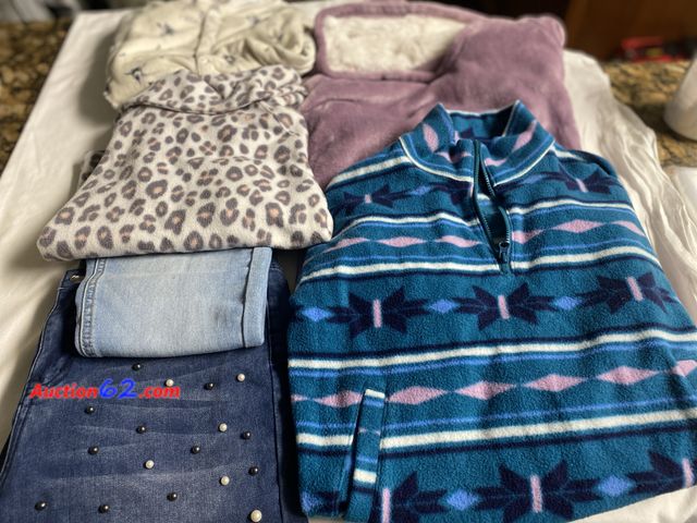 Lot 44-2109b - New. Midnight Velvet Girl’s size 12 stretch jeans with pearls on the legs and fringe on bottom. Opened for picture. Used size 10 one piece p...