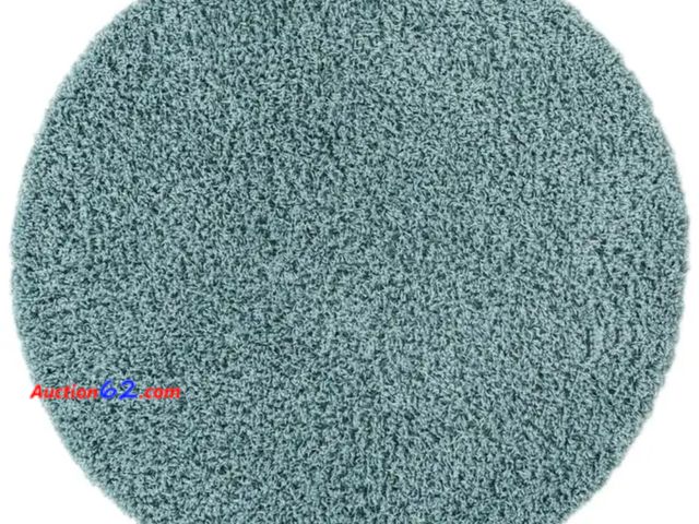 Lot 44-7313b - 6 ft round Solo solid shag slate blue  rug  Appears New, A basic inspection has been given to this item. Sold AS-IS. Never opened, Factory S...
