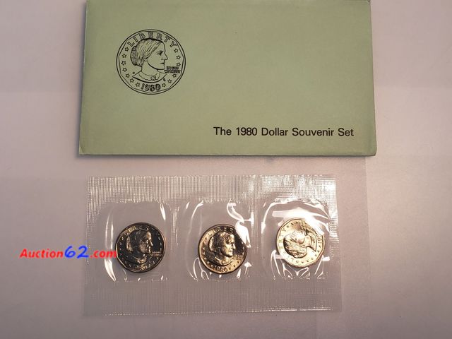 Lot 44-8343g - 1980 P D AND S SUSAN B ANTHONY BRILLIANT UNCIRCULATED DOLLAR SOUVENIR SET. THESE WERE NOT SOLD TO THE PUBLIC. THEY WERE ONLY MADE AVAILABLE ...