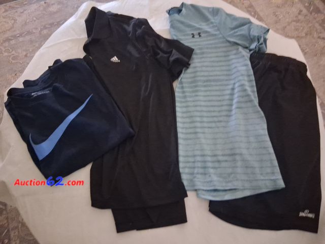Lot 44-2014o - One gently used men's size large Nike tee shirt.  One gently used men's size large Adidas shirt.  One gently used men's Under Armour size la...