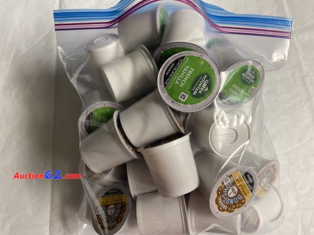 Lot 44-2102w - New.  Box was damaged. 20 K- cup original donut shop 1 step vanilla latte. 20 k-cup green mountain French vanilla coffee. See photos. Appear...