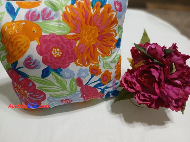 Lot 44-2009i - New without tag spring pillow, measures approximately 15" x 15". New with tag flower arrangement, measures approximately 9" x 7".  See photo...