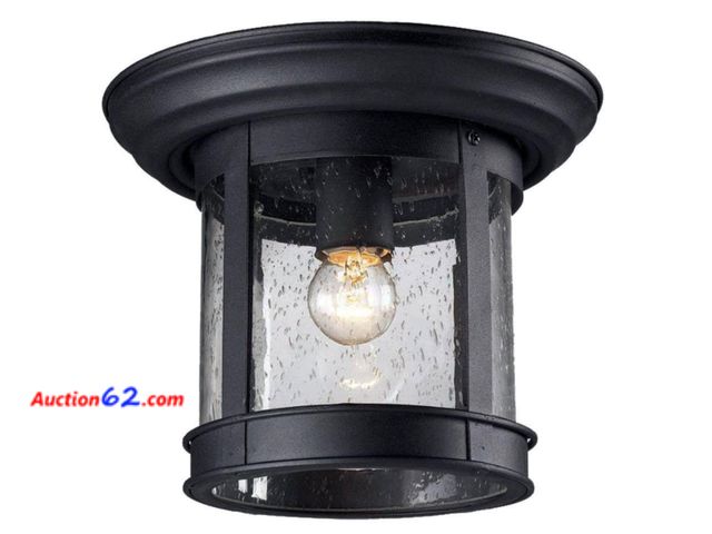 Lot 44-743b - Retail value $120- Lawerence 1-Light Black Lawrence Outdoor Flush Mount with Clear Seeded Glass Shade 1. Appears New, A basic inspection has...