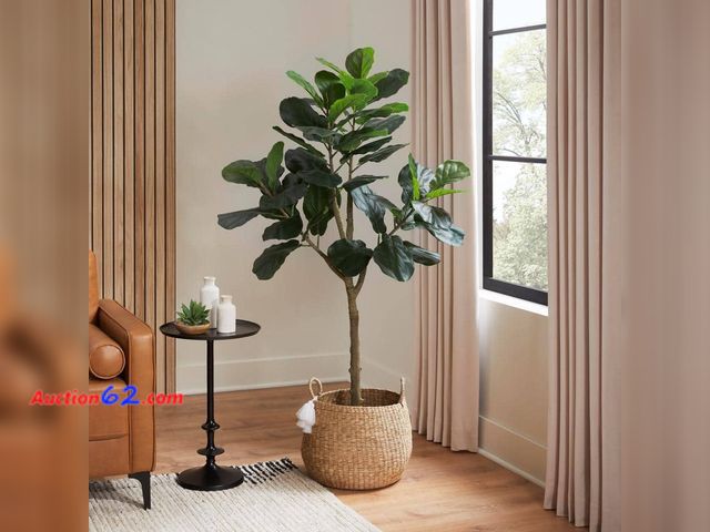 Lot 44-565t - Retail value- $129- 5ft Faux Fiddle Leaf Fig Tree in White Pot Appears New, A basic inspection has been given to this item. Sold AS-IS. Not ...
