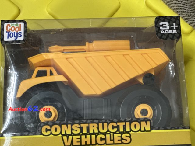 Lot 44-7504b - Cool toys construction vehicles dump truck comes with screwdriver to take apart. New. Ages 3 5. Not Tested 13. Never opened, Factory Sealed