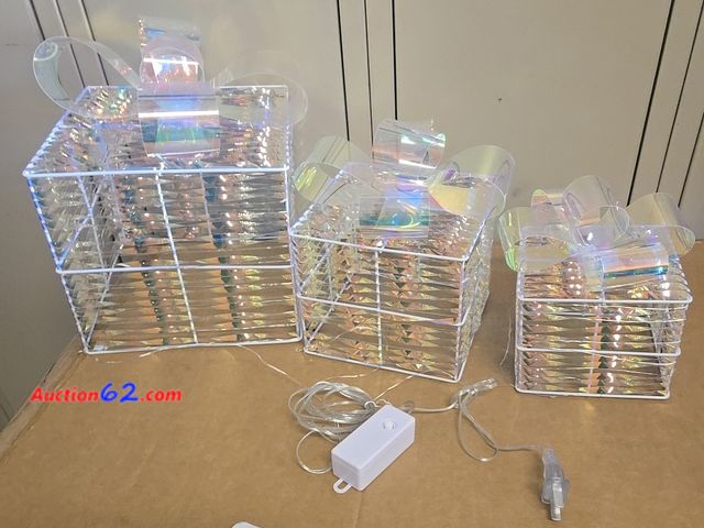 Lot 44-6534t - Set of 3 Christmas 150 LED Lighted Gift Boxes, 8 Lighting Modes, with Colored Lights Appears New, A basic inspection has been given to this ...