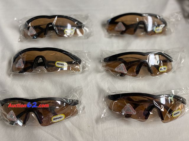 Lot 44-2018w - New 6 pairs driving sunglasses. Poly carbon lenses. See photos. Appears New, A basic inspection has been given to this item. Sold AS-IS. See...
