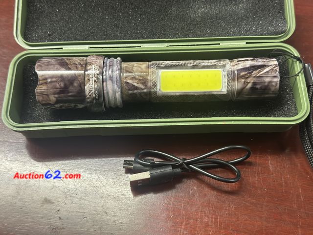 Lot 44-7528e - LED rechargeable flashlight 3 different settings regular flashing and led on the side, comes with case and usb cable. New See All Photo's Te...