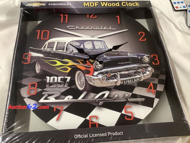 Lot 44-7558t - 1957 Chevy Belair wall clock approximately 13 inches. New. Licensed GM. See All Photo's Not Tested Never opened, Factory Sealed