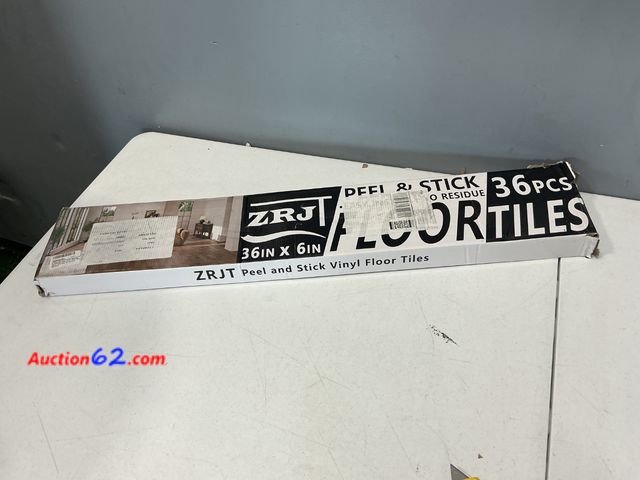 Lot 44-2570a - ZRJT Peel and Stick Vinyl Floor Tiles 36" x 6" 36 PCS Appears New, A basic inspection has been given to this item. Sold AS-IS. Not Tested Se...