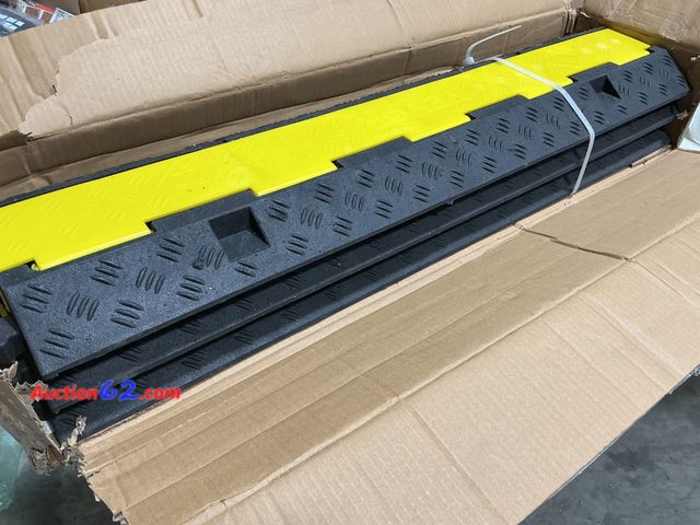Lot 44-243a - $150 Retail price - Heavy Duty Rubber Cable Protector Ramp with Yellow Safety Stripe See All Photo's Appears New, A basic inspection has bee...