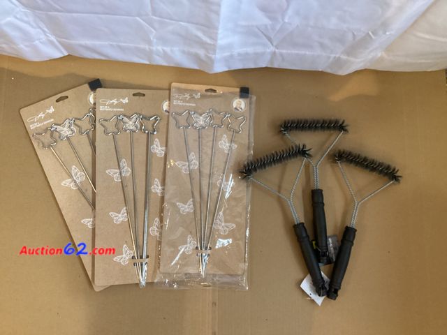 Lot 44-7712i - Lot of (3) Dolly Parton set of 4 butterfly skewers and (3) wire grill brushes.  Appears New, A basic inspection has been given to this item....