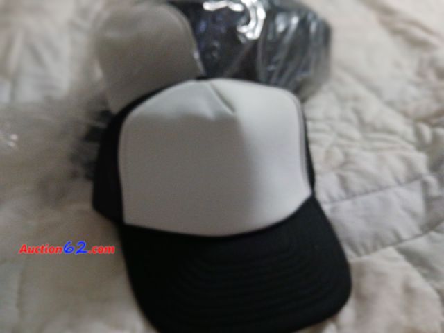 Lot 44-2316b - New total of 12 black and white hats. Mesh backs.  Great for printing or logos.  See photos. 1. Appears New, A basic inspection has been giv...
