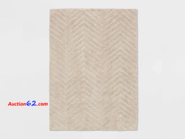 Lot 44-189b - 4'x5'6" Tufted Cotton Chevron Kids' Rug - Pillowfort™- Dirty  E-Commerce Return, A basic inspection has been given to this item. Sold AS-IS.