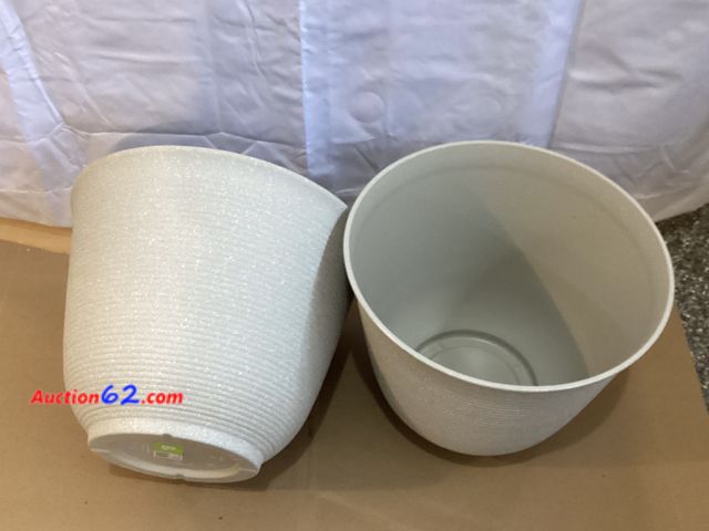 Lot 44-7709i - Lot of (2) 14” wide x 11” height tan plastic planters.  Appears New, A basic inspection has been given to this item. Sold AS-IS. See All Pho...