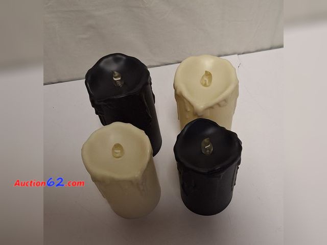 Lot 44-7436r - 4 PK Bundle B/O Pillar Candles  Appears New, A basic inspection has been given to this item. Sold AS-IS.