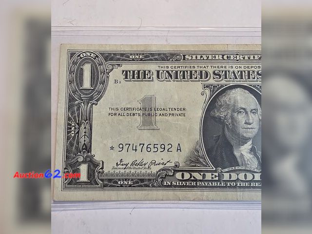 Lot 44-8356k - 1957 $1 SILVER CERTIFICATE STAR NOTE. CIRCULATED. A STAR NOTE IS A REPLACEMENT NOTE FOR WHERE AN ERROR OCCURRED IN THE PRINTING. FROM BACK I...