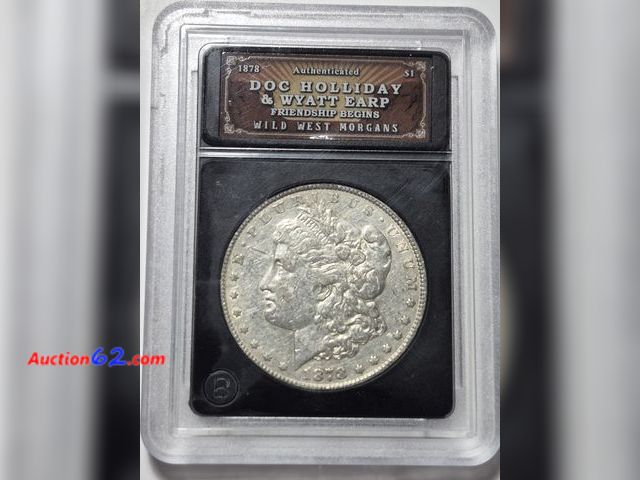 Lot 44-8341i - 1878 90% SILVER LIBERTY HEAD MORGAN DOLLAR IN A AUTHENTICATED DOC HOLLIDAY &amp; WYATT EARP FRIENDSHIP BEGINS. FROM THE WILD WEST MORGANS SE...