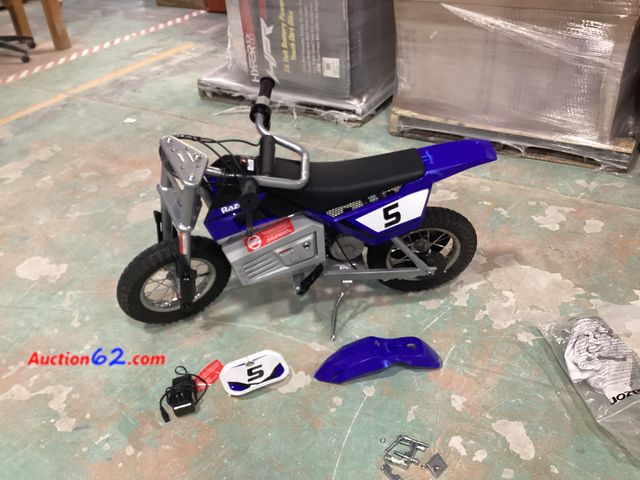 Lot 44-35h - Retail value $329- Razor 24V MX350 Dirt Rocket Electric Powered Ride-On Bike - Blue E-Commerce Return Powers On, Not Tested Further Used