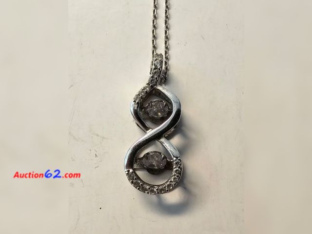 Lot 44-8301k - .925 STERLING SILVER PENDANT WITH A REALLY PRETTY CLEAR STONES THAT SPIN! AND A .925 STERLING SILVER NECKLACE.-T
