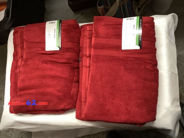 Lot 44-6064w - 4 Mainstays Bath Towels, maroon in color,New. 54x30 See All Photo's Not Tested Never opened, Factory Sealed