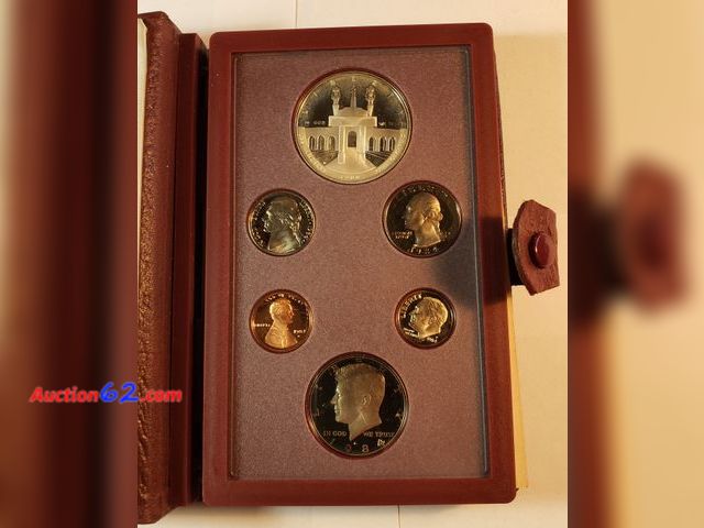 Lot 44-8300j - 1984 PRESTIGE SET WITH 90% SILVER OLYMPIC COMMEMORATIVE PROOF DOLLAR, KENNEDY HALF PROOF DOLLAR, WASHINGTON PROOF QUARTER, ROOSEVELT PROOF D...