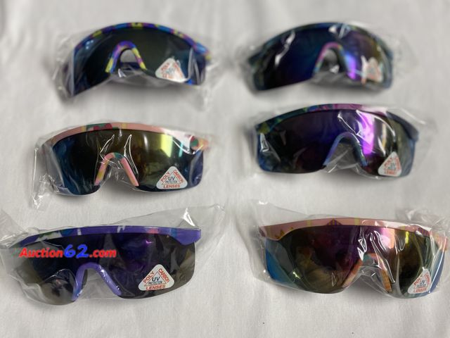 Lot 44-2124j - New. 6 pair multi color frame youth sunglasses with dark lens. Poly Carbon Lenses. UV Protection. See photos. No Stock Pic See All Photo's A...