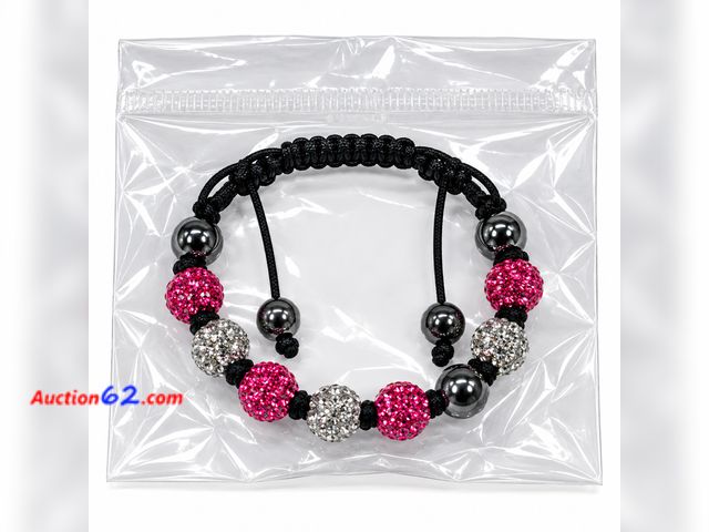 Lot 44-6134m - Ladies bracelet 7-9 in adjustable pink and crystal color stones. Appears New, A basic inspection has been given to this item. Sold AS-IS. Se...