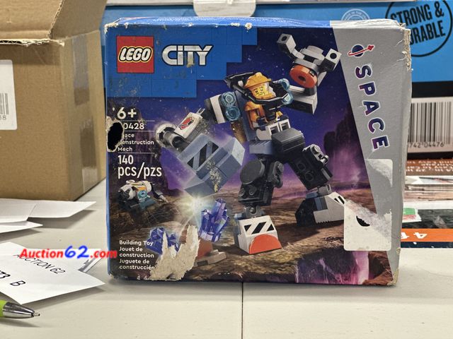 Lot 44-7573b - Lego city space ages 6+ 60428.New. BOX HAS SEVEAR DAMAGE. See photo.  5. Not Tested 13. Never opened, Factory Sealed