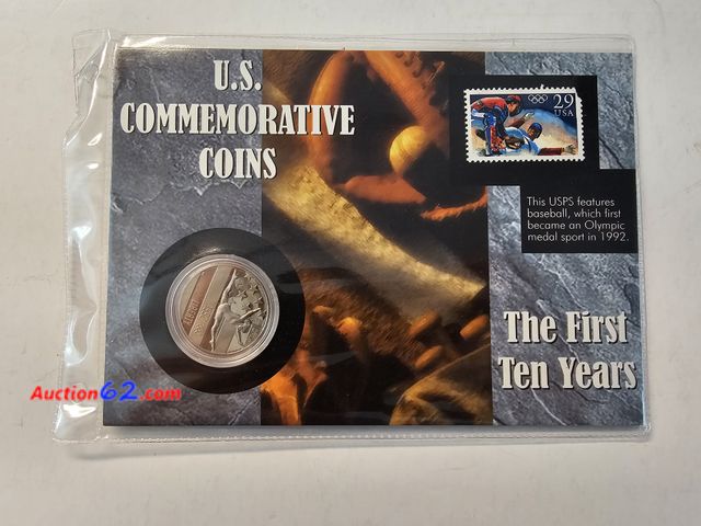 Lot 44-8354u - 1992 S PROOF GYMNAST CLAD HALF DOLLAR WITH 29¢ BASEBALL STAMP IN A COLLECTOR PANEL.-NT