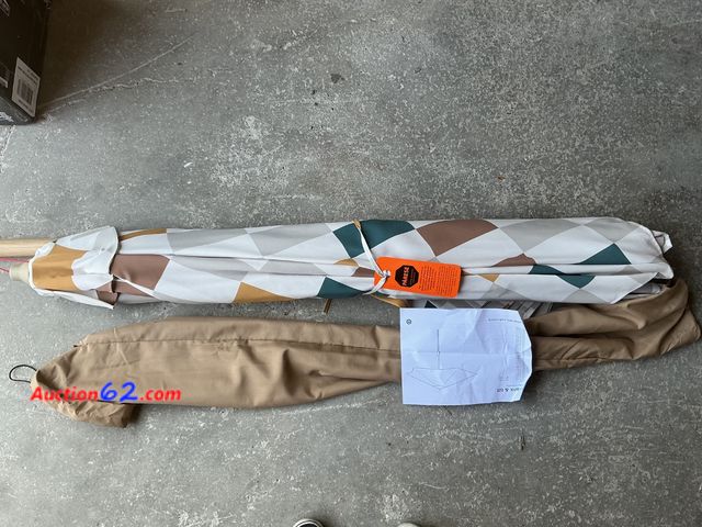 Lot 44-216 - Target Patio Umbrella with Crank &amp; Tilt See All Photo's Appears New, A basic inspection has been given to this item. Sold AS-IS.
