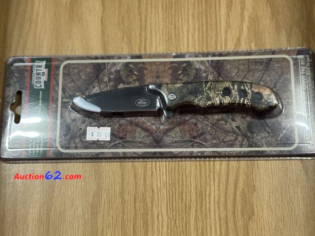 Lot 44-6082q - Spring assist pocket knife, 440 s.Steel blade mossy oak break up country camo print. Intergraded belt clip. By Kentucky cutlery #30027. See ...