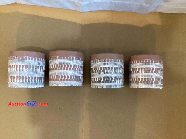 Lot 44-7704i - Lot of (4) mauve plastic planters.  Appears New, A basic inspection has been given to this item. Sold AS-IS. See All Photo's