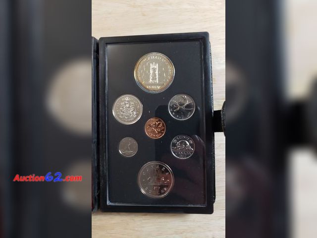 Lot 44-8314q - 1977 CANADIAN PROOF SET WITH .375 TROY OUNCE SILVER DOLLAR COMMEMORATING THE THRONE OF THE SENATE WITH THE QUEEN ON THE OTHER SIDE. THIS IS ...