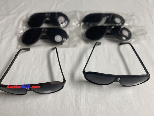 Lot 44-2115b - New. 6 pairs of super dark lens sunglasses. 4 pairs have black frames. 2 pairs have brown frames. See photos. Appears New, A basic inspectio...