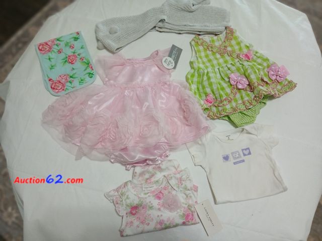 Lot 44-2104j - New with tags girls 0/3 month Nannette Baby Dress with diaper cover. One new with tag Laura Ashley 0/3 month onesie..  One gently used 3 mon...