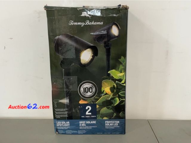 Lot 44-1510j - Tommy Bahama Smart Focus 100/60 Lumen Spot Light with Remote Solar Panel 2 Pack Not Tested See All Photo's E-Commerce Return, A basic inspec...