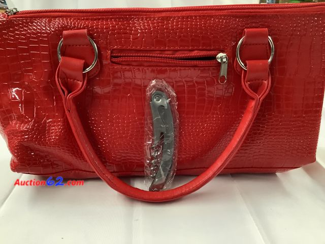 Lot 44-7539p - Red lunch or hand bag. See photos. Not Tested Never opened, Factory Sealed See All Photo's Never opened, Factory Sealed