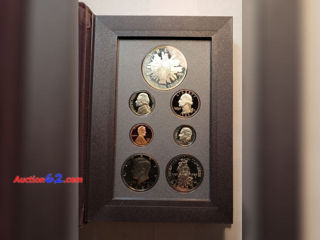 Lot 44-8320v - 1989 PRESTIGE SET WITH 90% PROOF SILVER CONGRESSIONAL COMMEMORATIVE DOLLAR. IN ORIGINAL US MINT GOVERNMENT PACKAGING AND BOX. ALSO INCLUDES ...